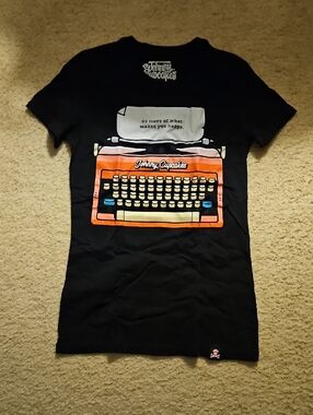 Johnny Cupcakes Black Tee with Orange and Cream Typewriter Print